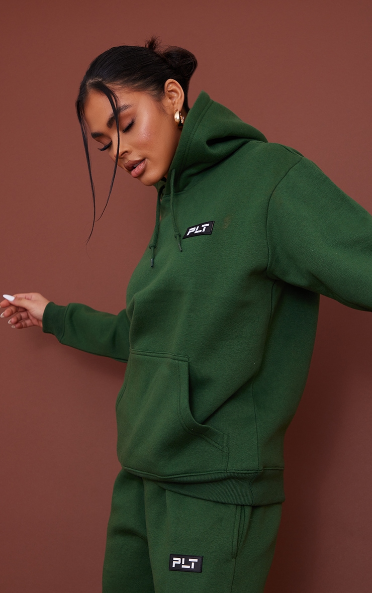 Hoodie in Green for Woman at PrettyLittleThing GOOFASH