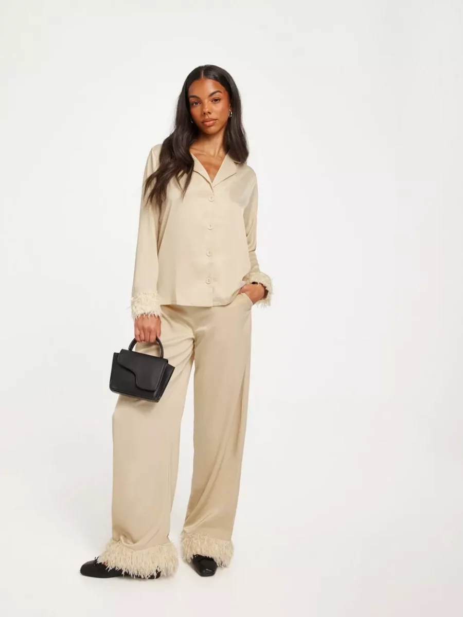 Jumpsuit in Cream by Nelly GOOFASH