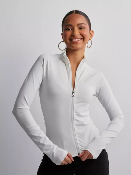 Lady Zip Jacket in White from Nelly GOOFASH