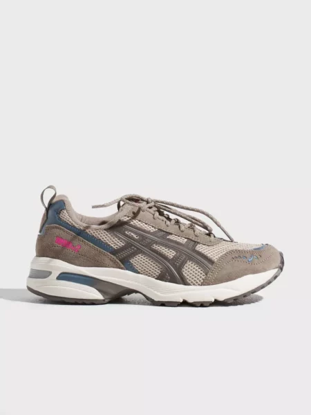 Nelly Sneakers in Grey for Women by Asics GOOFASH