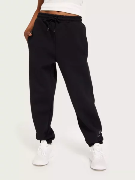Nelly Women's Sweatpants in Black from Adidas GOOFASH