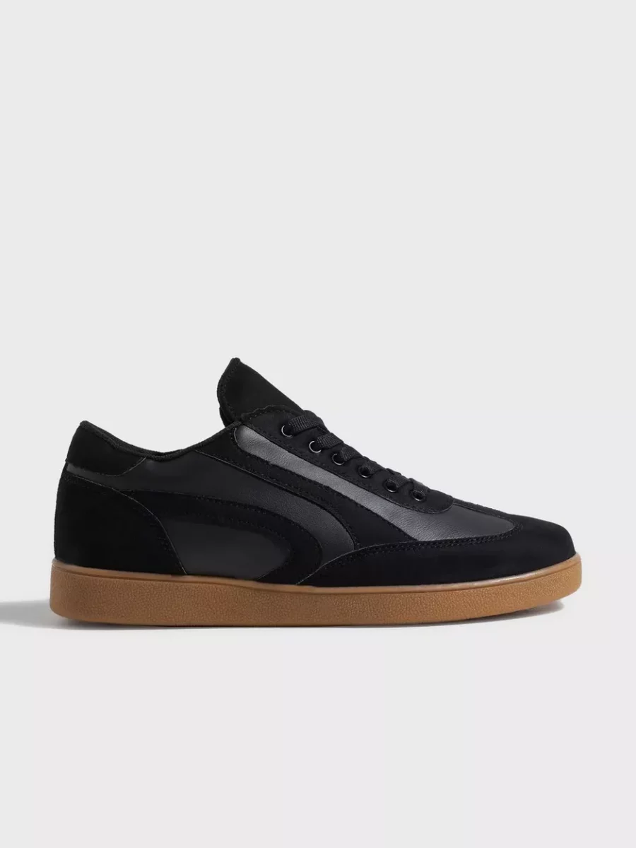 Woman Black Sneakers by Nelly GOOFASH