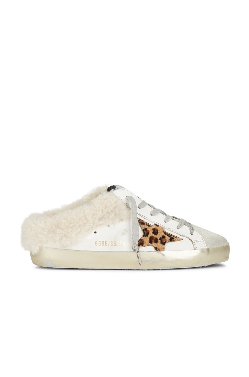 Revolve - Sneakers in Gold from Golden Goose GOOFASH